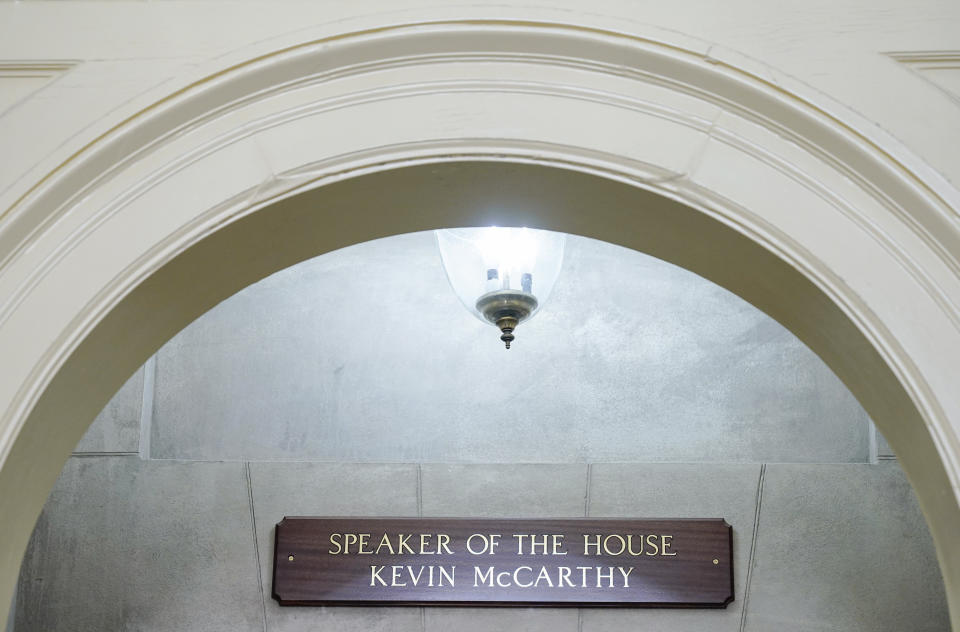 A sign still bearing the name of Rep. Kevin McCarthy, R-Calif., is seen outside the office of the Speaker of the House on Capitol Hill, Monday, Oct. 23, 2023, in Washington. (AP Photo/Mariam Zuhaib)