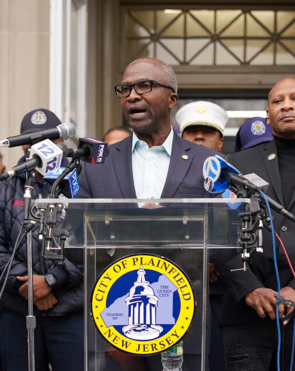 Plainfield Mayor Adrian Mapp speaks at a press conference on the steps outside City Hall after city firefighter Marques Hudson died battling a blaze Friday morning.