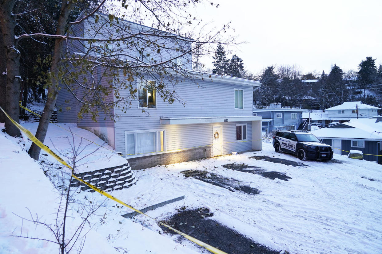 Police tap surrounds the home where four University of Idaho students were found dead (Ted S. Warren / AP file)