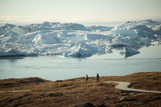 <p>Acacia Johnson/Courtesy of Quark Expeditions</p> Trekking near Ilulissat Icefjord, in western Greenland.