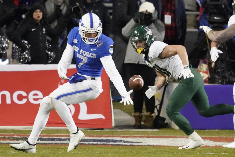 Air Force wide receiver David Cormier (7) reaches for a pass, that fell incomplete, in front of Baylor safety Griffin Speaks (31) during the first half of the Armed Forces Bowl NCAA college football game in Fort Worth, Texas, Thursday, Dec. 22, 2022. (AP Photo/LM Otero)