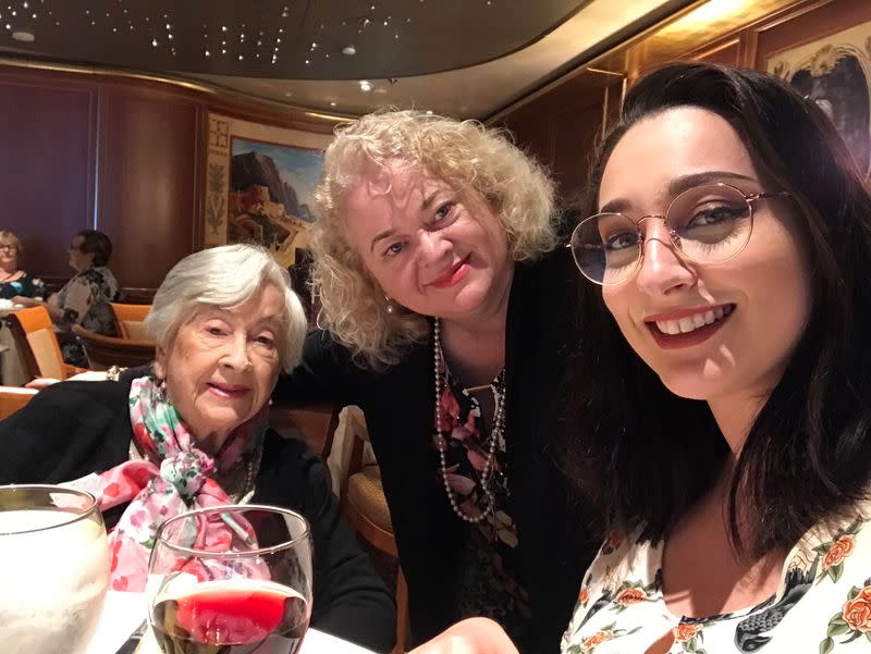 Sydney businesswoman Janet Dixon-Hughes, daughter Polly and her 95-year-old mother Wynne King pose for a photo on the Ruby Princess as the cruise ship sails in international waters