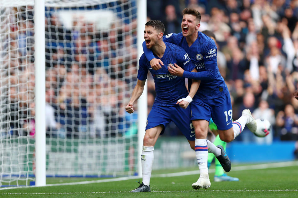Jorginho (left) celebrates with Chelsea teammate Mason Mount after scoring what turned out to the game-winning goal in Saturday's victory against Brighton. (Dan Istitene/Getty)