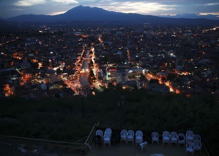 Seats are placed before the screening of a film in an open-air cinema on the medieval Prizren fortress during Dokufest in Prizren, southwest of capital Pristina August 20, 2014. REUTERS/Hazir Reka