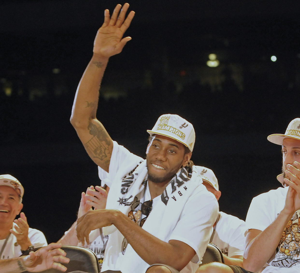 Kawhi Leonard acknowledges the San Antonio fans during a celebration of the Spurs’ 2014 NBA title. (Getty Images)