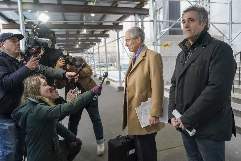 Michael Cohen, right, and his attorney Lanny Davis speak to reporters after meeting with Manhattan prosecutors, Friday, March 10, 2023, in New York. (AP Photo/Mary Altaffer)