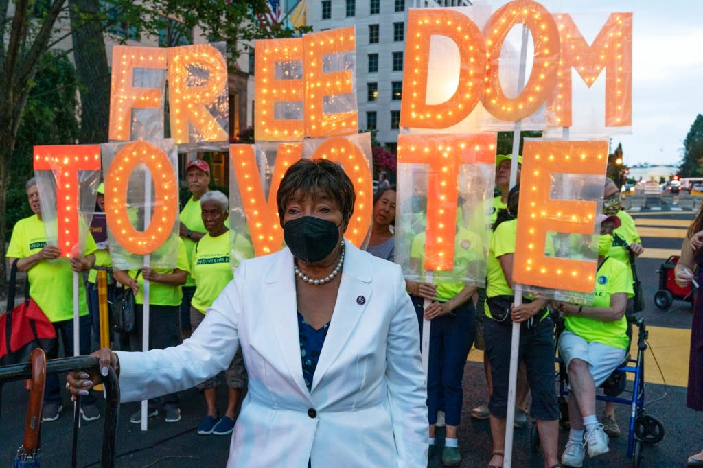 U.S. Rep. Eddie Bernice Johnson, D-Texas, participates in the Good Trouble Candlelight Vigil for Democracy, supporting voting rights, at Black Lives Matter Plaza in Washington, Saturday, July 17 2021. (AP Photo/Jose Luis Magana, File)