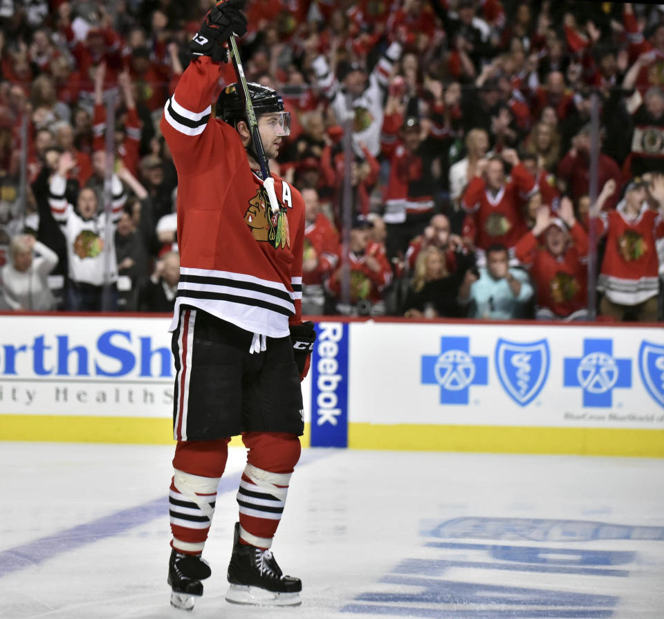 FILE - Chicago Blackhawks defenseman Brent Seabrook reacts to his first period goal against the St. Louis Blues in Game 3 of an NHL hockey first-round Stanley Cup playoff series in Chicago, in this Sunday, April 17, 2016, file photo. Longtime Chicago Blackhawks defenseman and three-time Stanley Cup winner Brent Seabrook announced Friday, March 5, 2021, he’s unable to continue playing hockey because of injury. (John Starks/Daily Herald via AP, File)