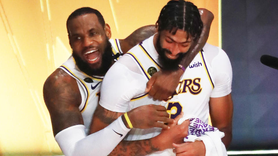 LeBron James and Anthony Davis are pictured celebrating together after winning the 2020 NBA Finals.