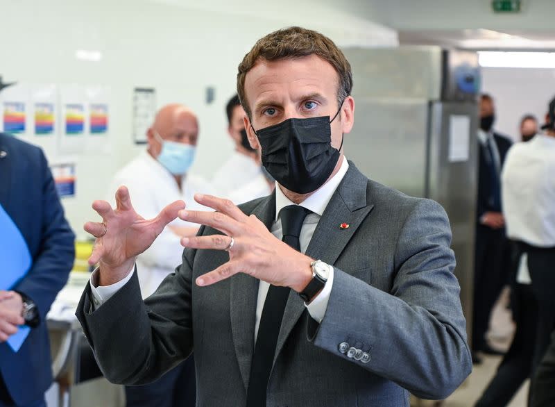 French President Emmanuel Macron speaks to journalists at the Hospitality school in Tain l'Hermitage