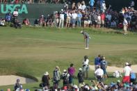 Jun 17, 2018; Southampton, NY, USA; Brooks Koepka putts the sixteenth green during the final round of the U.S. Open golf tournament at Shinnecock Hills GC - Shinnecock Hills Golf C. Mandatory Credit: Brad Penner-USA TODAY Sports