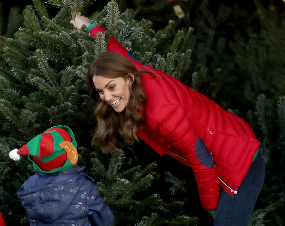 Kate spent time helping the children pick out Christmas trees.&nbsp; (Photo: Chris Jackson via Getty Images)