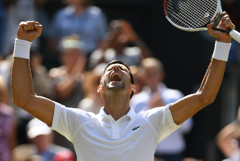 Roar: Novak Djokovic celebrates after beating Kei Nishikori