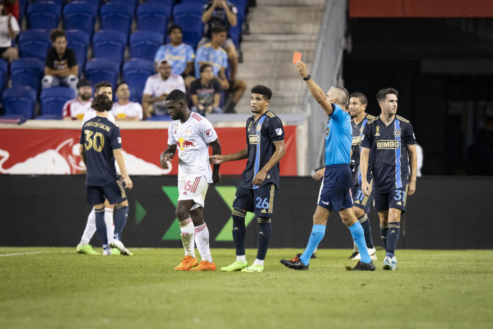 HARRISON, NJ - SEPTEMBER 03: Dru Yearwood #16 of New York Red Bulls gets a red card in the second half of the Major League Soccer match against New York Red Bulls at Red Bull Arena on September 3, 2022 in Harrison, New Jersey. (Photo by Ira L. Black - Corbis/Getty Images)