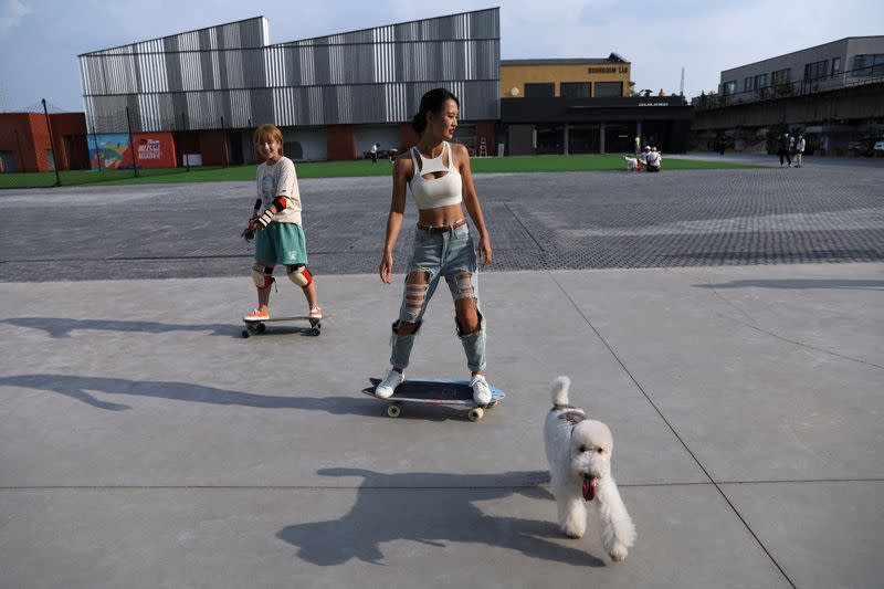 The Wider Image: Amid COVID shutdowns, Chinese women flock to skateboarding