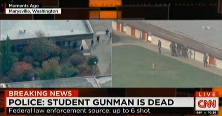 This video grab courtesy of CNN and affiliate KIRO TV News, shows police at Marysville-Pilchuck High School in Marysville, Washington on October 24, 2014