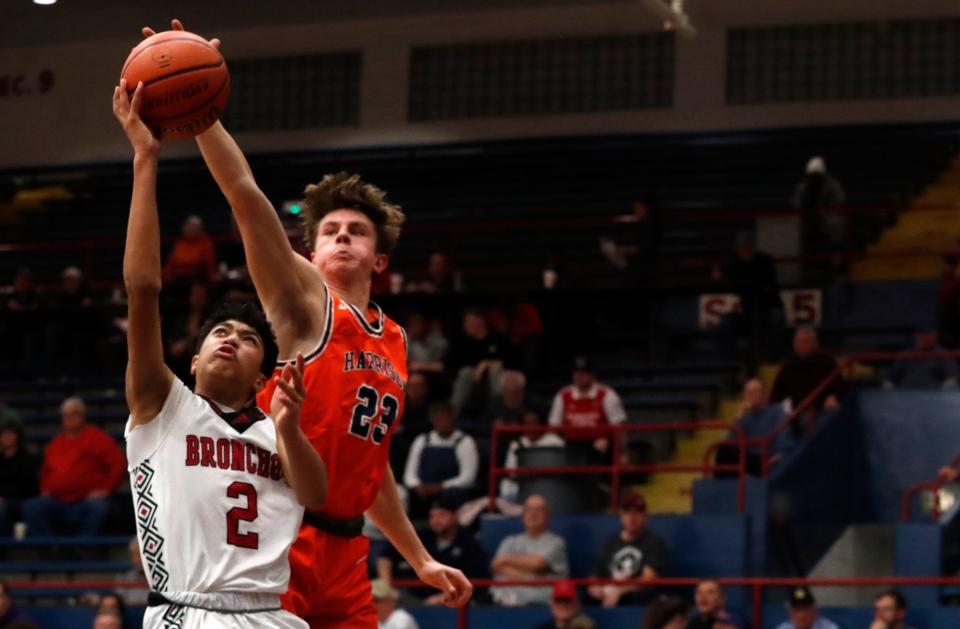 Lafayette Jeff Bronchos Alonzo Clawson-Smith (02) has his shot blocked by Harrison Raiders Alex Mithoefer (23) during the IHSAA boy’s basketball sectional game, Tuesday, Feb. 28, 2023, at Memorial Gymnasium in Kokomo, Ind. Harrison won 54-39.