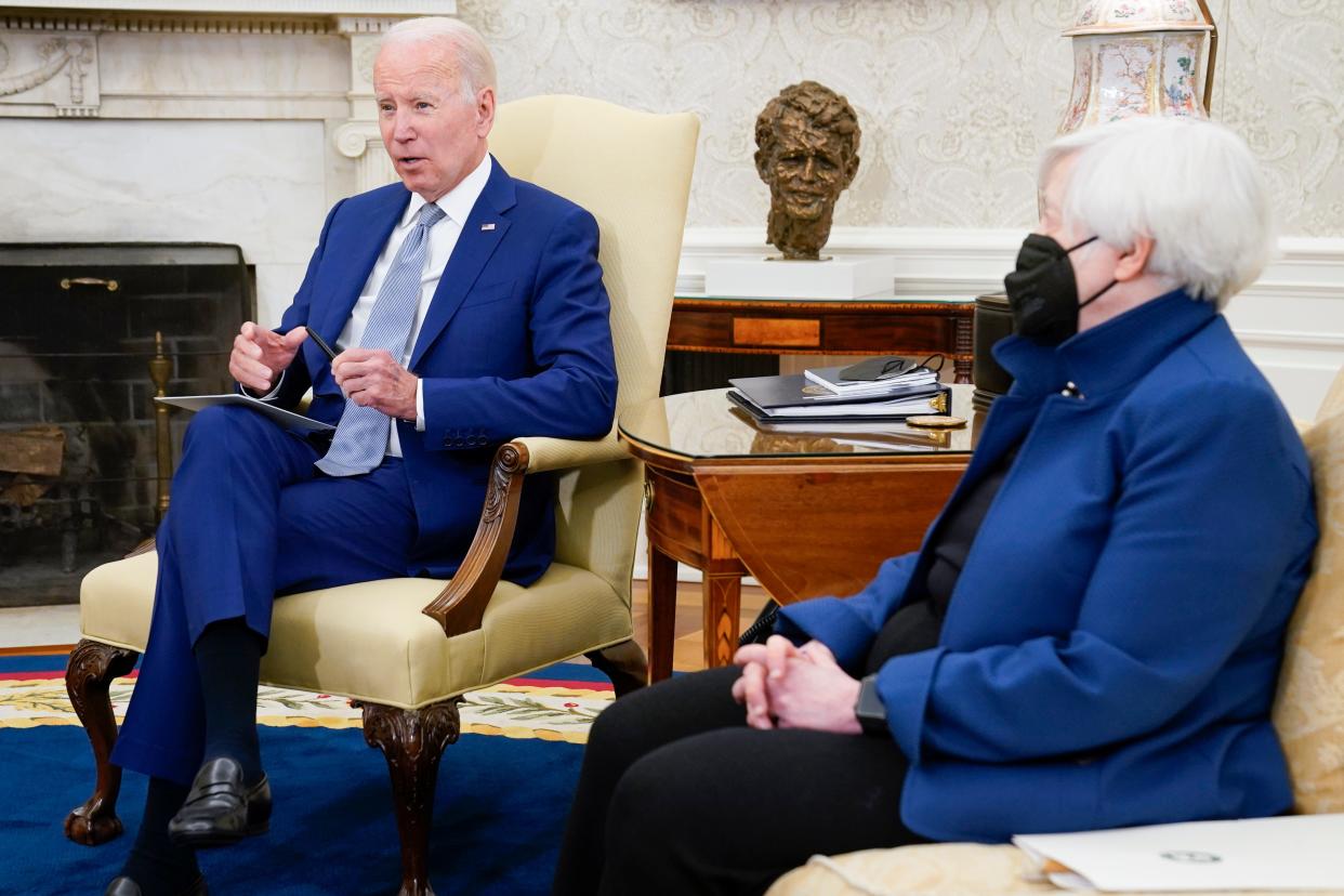 President Joe Biden meets with Treasury Secretary Janet Yellen, right, in the Oval Office of the White House, Tuesday, May 31, 2022, in Washington. (AP Photo/Evan Vucci) ORG XMIT: DCEV438