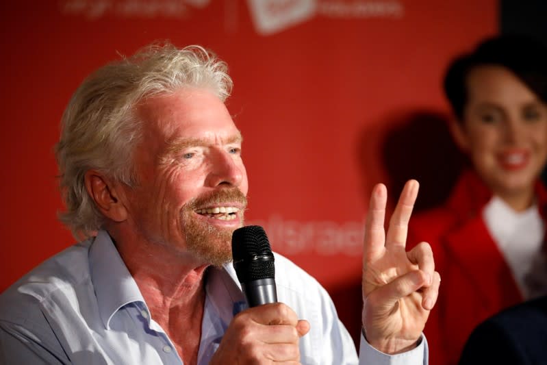 Virgin's Richard Branson attends a news conference after landing at the Ben Gurion international airport near Tel Aviv