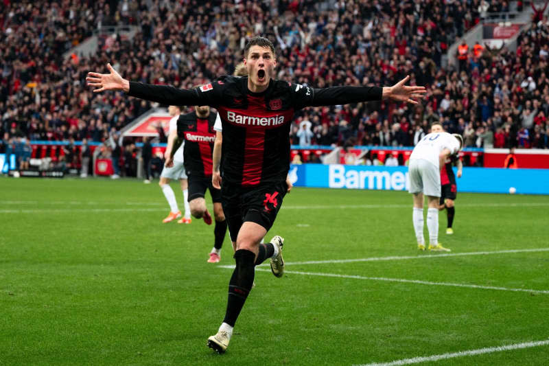 Leverkusen's Patrik Schick celebrates scoring during the German Bundesliga soccer match between Bayer Leverkusen and TSG 1899 Hoffenheim at BayArena. Marius Becker/dpa