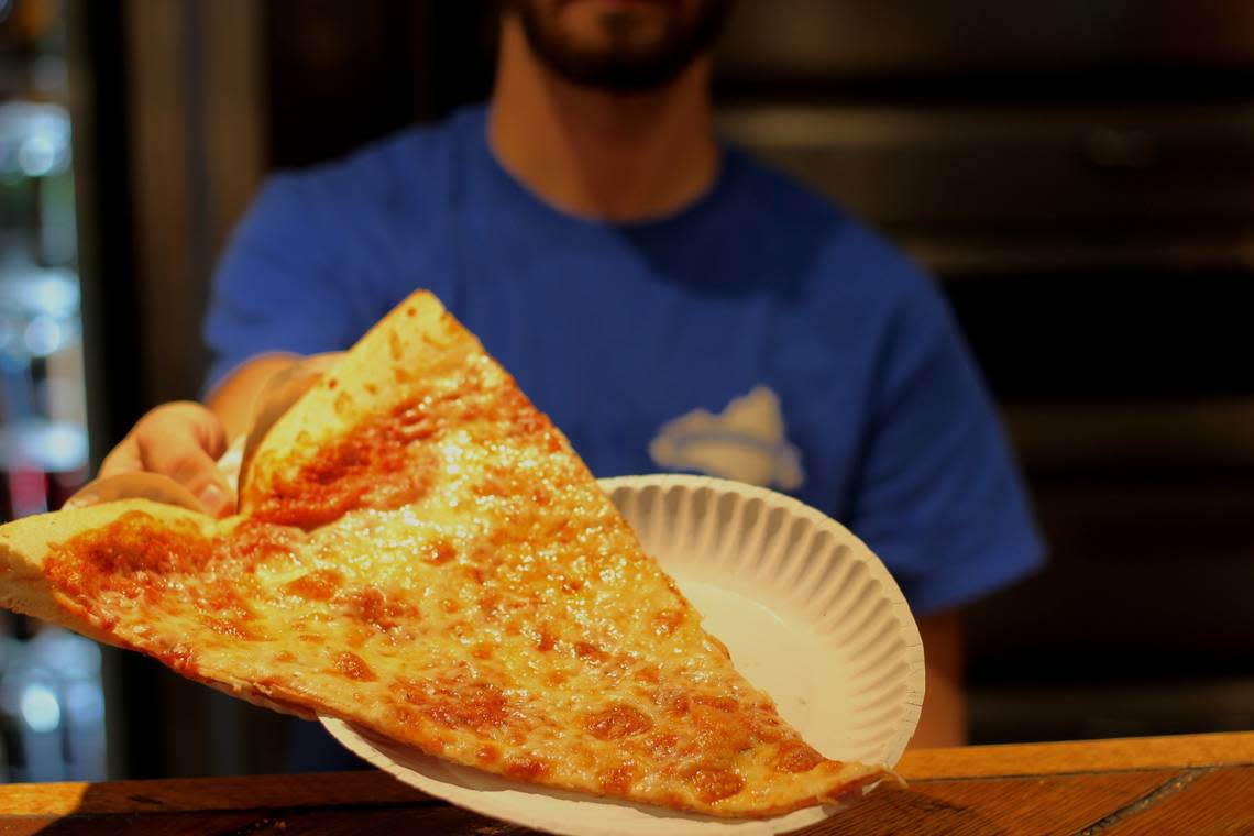 A slice of cheese pizza from Benny Pennello’s in Charlotte, NC.