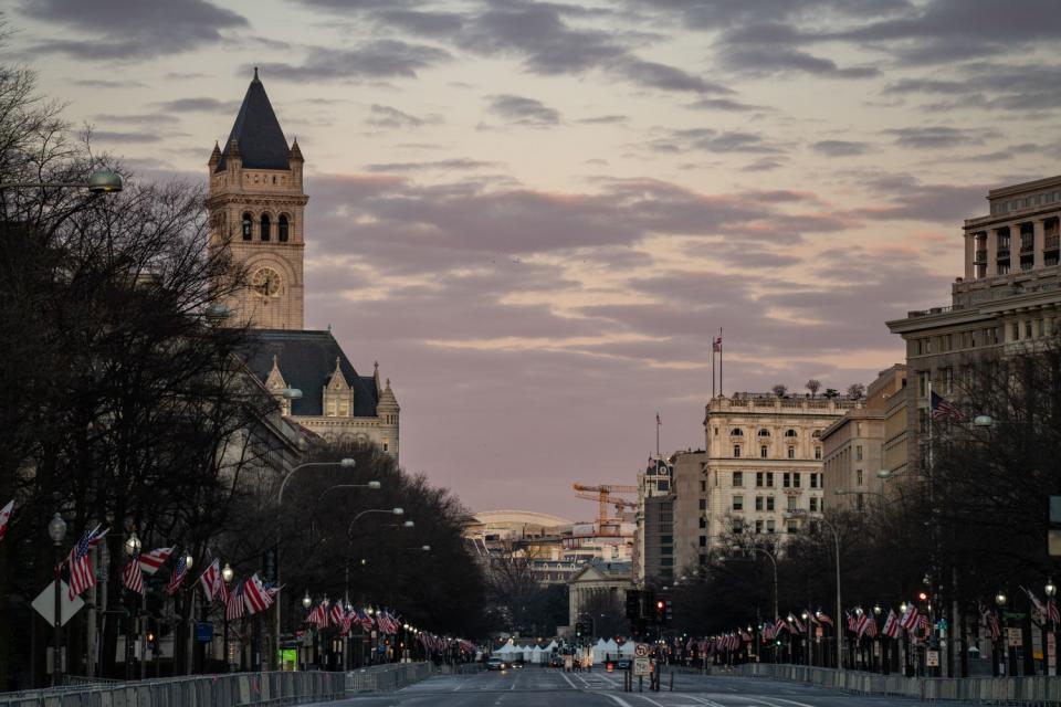 Downtown streets like this stretch of Pennsylvania Avenue are nearly empty.