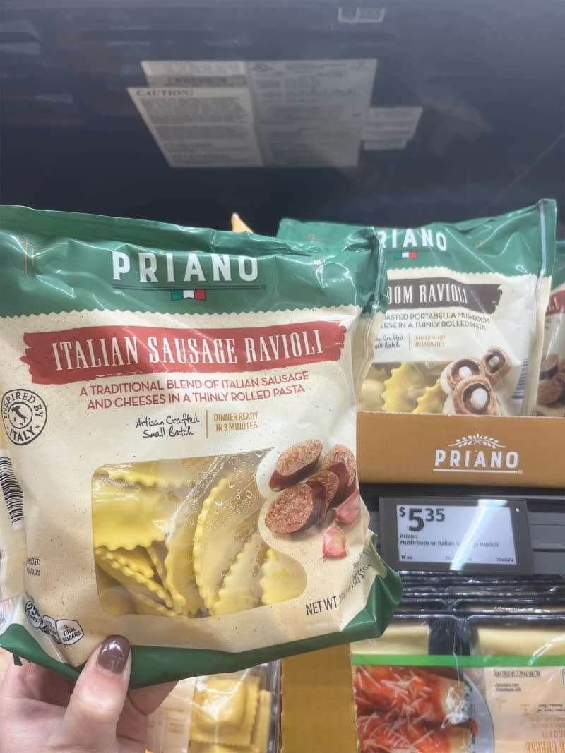 Someone holding Italian Sausage Ravioli.