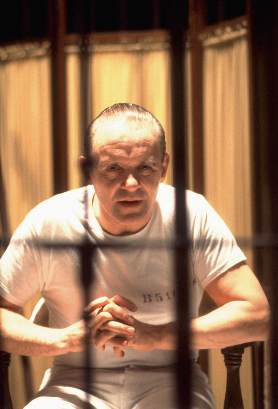 Anthony Hopkins as Hannibal Lecter in a cage
