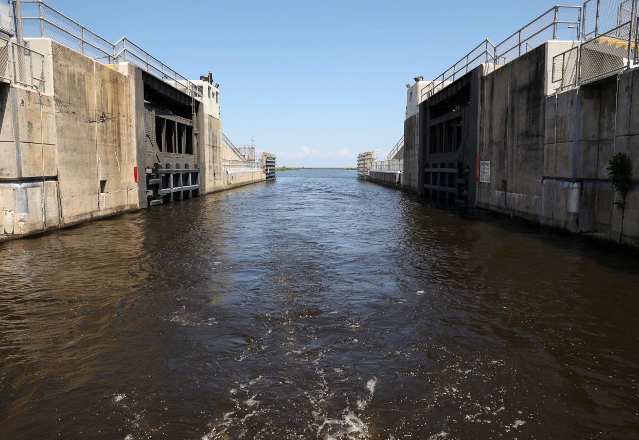 The Herbert Hoover Dike surrounds 143 miles of Lake Okeechobee and measures 34 feet tall and 200 feet wide at its base.
