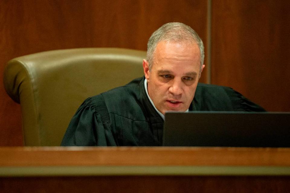 Judge Brandon Ladner talks with witnesses and defendants over a zoom call during an initial hearing for three men, who are charged with murder at a residence in Gaston Point over New Year’s Eve, at Harrison County Justice Court in Gulfport on Wednesday, Jan. 19, 2022.