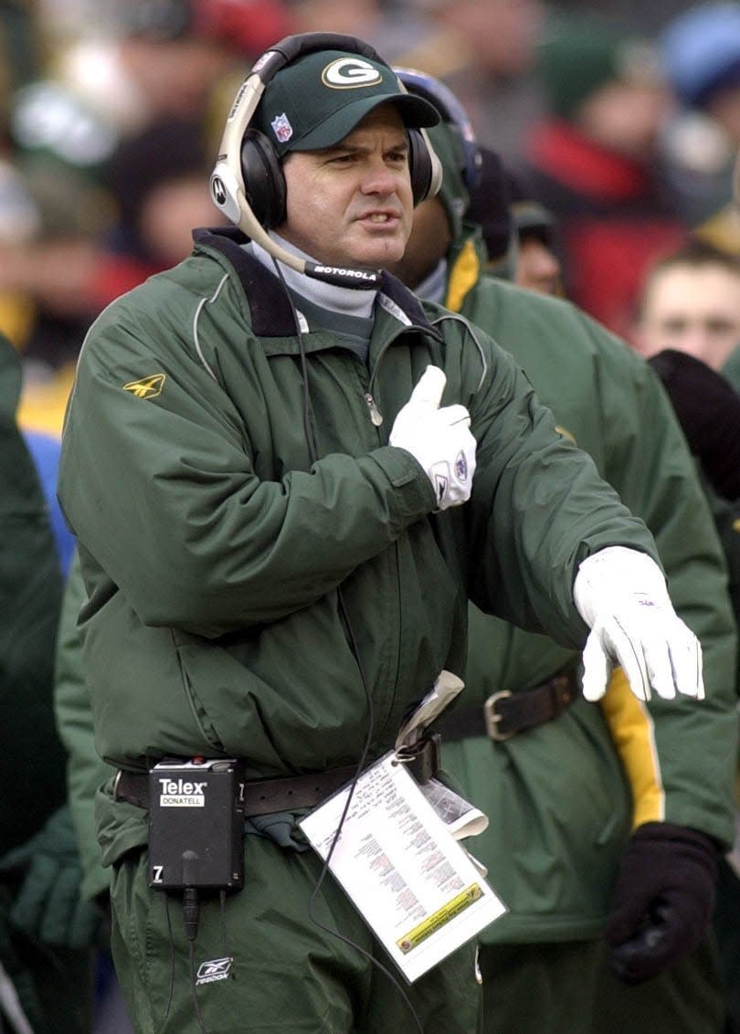 Green Bay Packers defensive coordinator Ed Donatell calls plays from the sideline during the first quarter of their game against the Buffalo Bills Sunday, Dec. 22. 2002 at Lambeau Field in Green Bay, Wis.