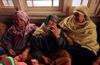 Relatives of Adil Ahmad Dar, who according to police carried out the suicide attack on the Central Reserve Police Force (CRPF) convoy and killed 44 of them on Thursday, mourn inside Adil's residence in Gundbagh village in south Kashmir's Pulwama district, February 15, 2019. REUTERS/Danish Ismail