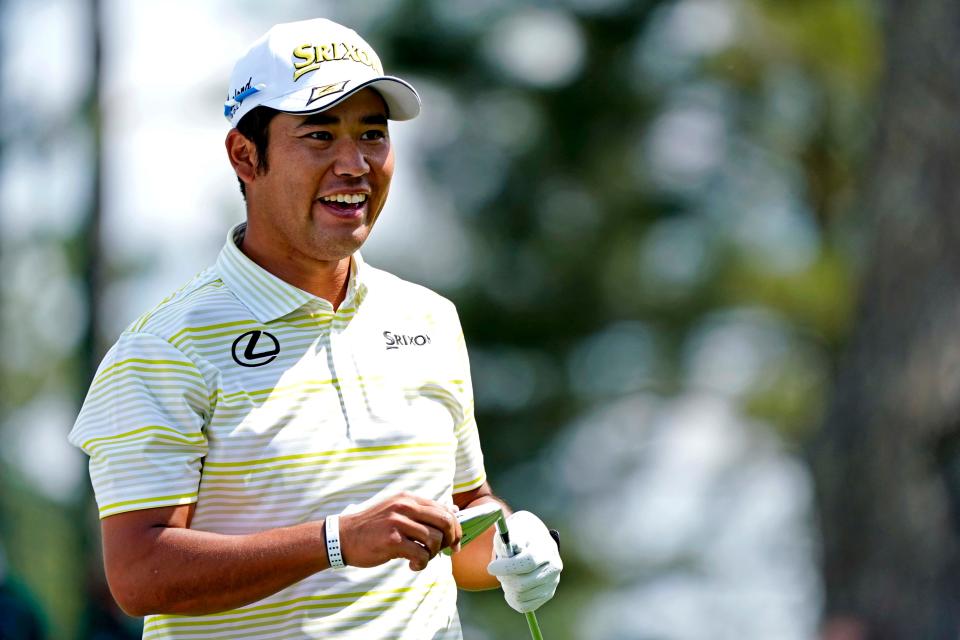 Hideki Matsuyama walks off the third tee during the final round of the Masters golf tournament Sunday. For complete coverage, please visit USA Today.com.