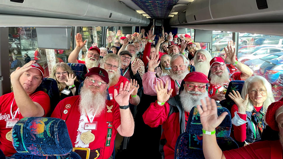 A group of Santas at the Charles W Howard Santa School head out on a field trip. A good reminder that Santa Claus, and all these Santa Clauses, are headed to town. (Ezra Kaplan / NBC News)