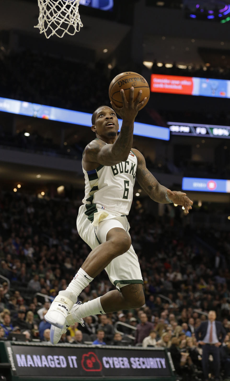 Milwaukee Bucks' Eric Bledsoe shoots against the Washington Wizards during the second half of an NBA basketball game Tuesday, Jan. 28. 2020, in Milwaukee. (AP Photo/Jeffrey Phelps)