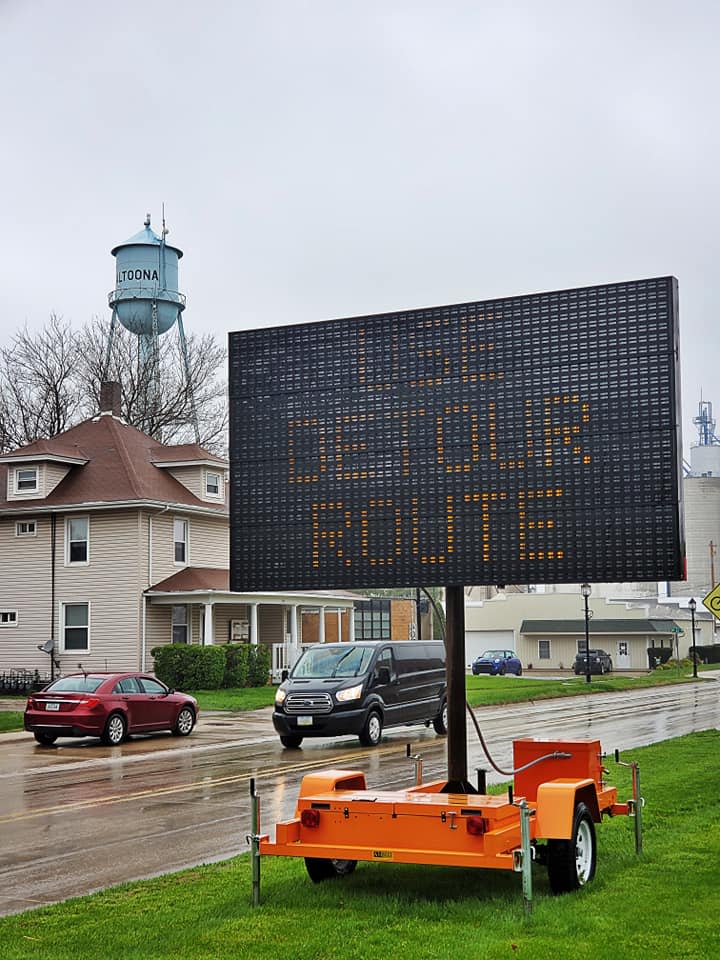 A sign warns drivers of an impending detours along Altoona's First Avenue. Crews are widening the roadway.