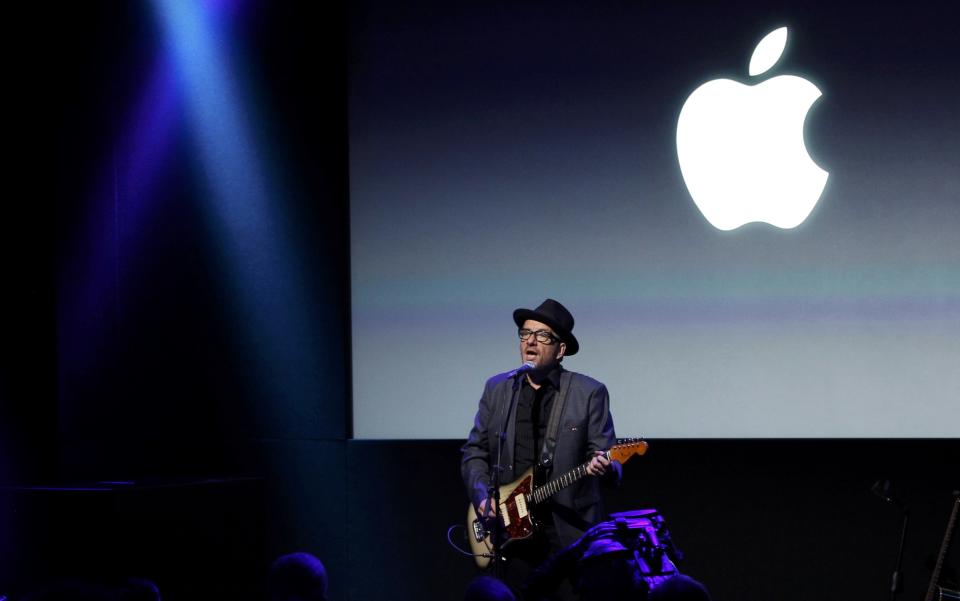 Singer Elvis Costello performs during Apple Inc's media event in Cupertino, California September 10, 2013. (REUTERS/Stephen Lam)