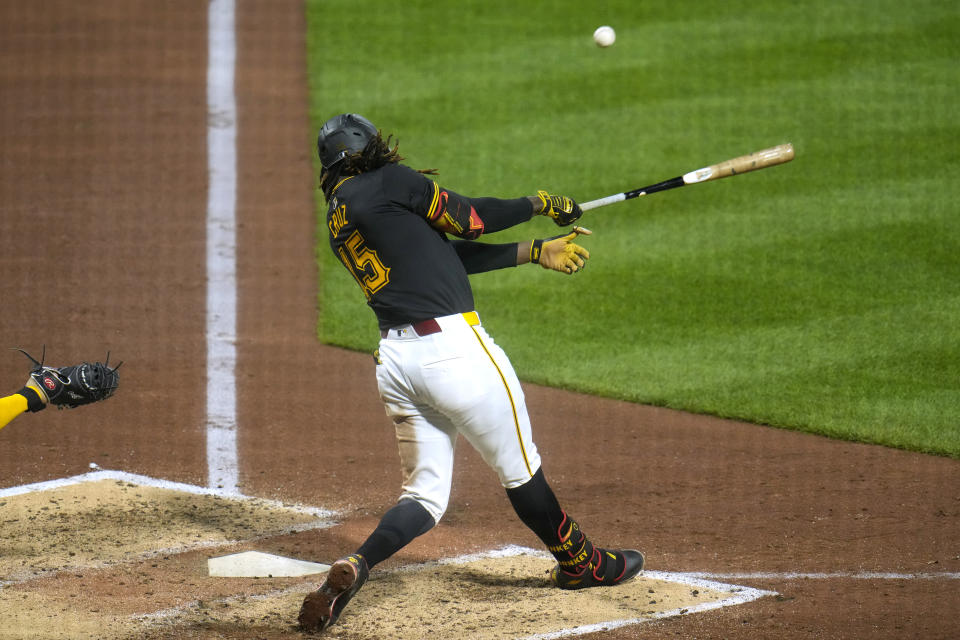 Pittsburgh Pirates' Oneil Cruz singles off Milwaukee Brewers relief pitcher Hoby Milner, driving in two runs, during the sixth inning of a baseball game in Pittsburgh, Monday, April 22, 2024. (AP Photo/Gene J. Puskar)