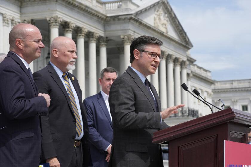 Speaker of the House Mike Johnson, R-La., joined at left by Sen. Mike Lee, R-Utah, Rep. Chip Roy, R-Texas, talks to reporters about requiring American citizenship to vote in national elections, as they introduce the Safeguard American Voter Eligibility Act, at the Capitol in Washington, Wednesday, May 8, 2024. (AP Photo/J. Scott Applewhite)