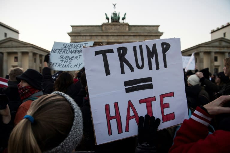 Anti-Trump protesters rally in front of Berlin's Brandenburg Gate on November 12, 2016