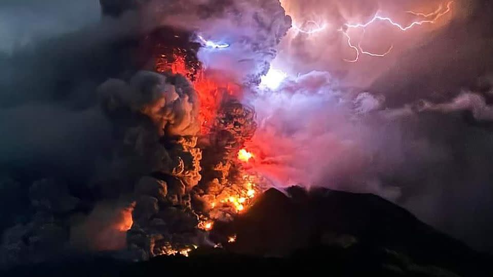 Mount Ruang spewed lava and ash on April 17, as seen from Sitaro, North Sulawesi.  It also triggered lightning in the ash cloud – a common phenomenon in powerful volcanic eruptions.  - Center for Volcanology and Geological Risk Mitigation/AFP/Getty Images