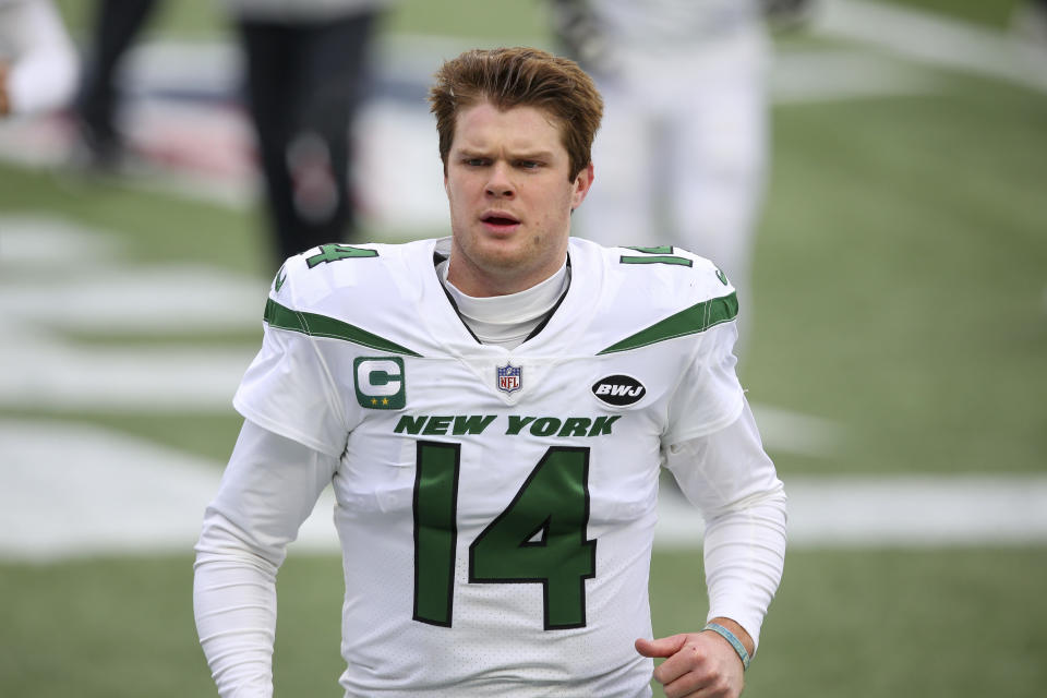 FILE - In this Sunday, Jan. 3, 2021, file photo New York Jets quarterback Sam Darnold warms up before an NFL football game against the New England Patriots in Foxborough, Mass. The New York Jets traded Darnold Monday, April 5, 2021, to the Carolina Panthers, ending a stint that was marked by a few flashes of brilliance, inconsistent play, and unfortunate injuries. (AP Photo/Stew Milne, File)