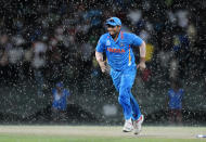 COLOMBO, SRI LANKA - SEPTEMBER 28: Suresh Raina of India runs back to the pavilion as it starts raining during the super eight match between Australia and India held at R. Premadasa Stadium on September 28, 2012 in Colombo, Sri Lanka. (Photo by Pal Pillai/Getty Images)