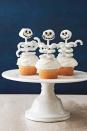 <p>Who could resist a cute cupcake with a skeletal frame comprised of a marshmallow skull and yogurt mini pretzel ribs supported by a lollipop stick? Whip up a batch of these bony characters with your favorite cake mix and canned frosting. </p><p><strong><a href="https://www.countryliving.com/food-drinks/recipes/a32657/skeleton-cupcakes-recipe-122708/" rel="nofollow noopener" target="_blank" data-ylk="slk:Get the recipe for Skeleton Frame Cupcakes" class="link ">Get the recipe for Skeleton Frame Cupcakes</a>.<br></strong></p>