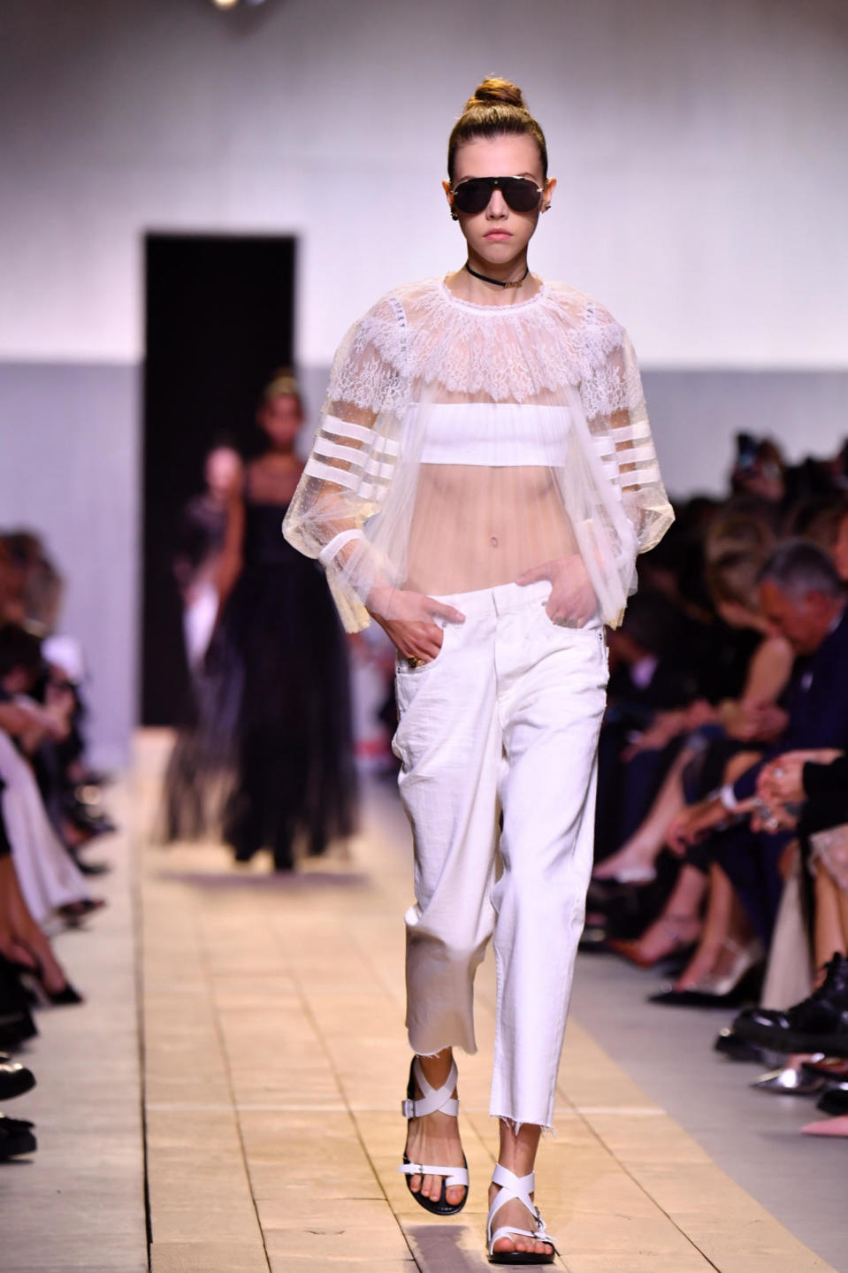 <p>The blue stuff hasn’t been seen on the Dior catwalk for some time. But this season, Chiuri took the fabric’s easy-to-wear charm, dyed it white and paired it with sheer ruffled tops. </p><p><i>[Photo: Getty]</i></p>