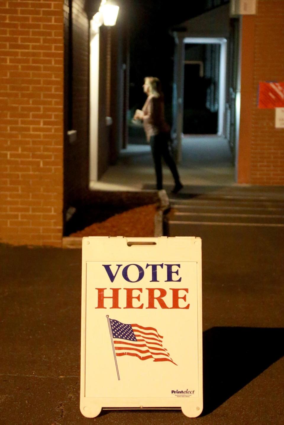 A voter looks into the social hall at First Baptist Church in Garden City just before the polls opened on Tuesday morning.