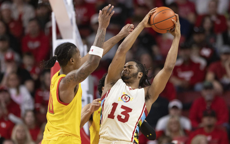 Nebraska's Derrick Walker, right, plays against Maryland's Julian Reese during the second half of an NCAA college basketball game Sunday, Feb. 19, 2023, in Lincoln, Neb. (AP Photo/Rebecca S. Gratz)