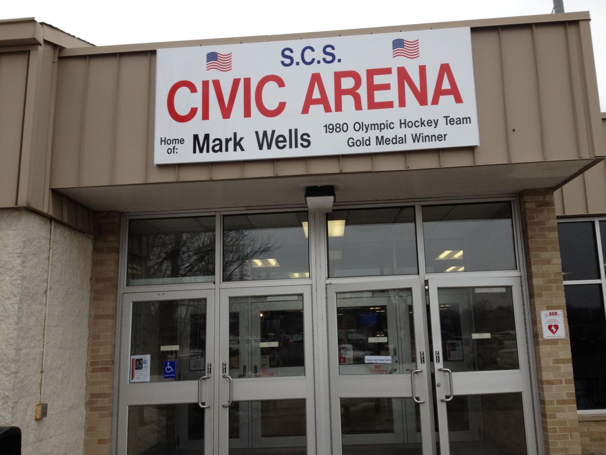 Mark Wells’ name is on the sign at St. Clair Shores Civic Arena on March 2, 2014