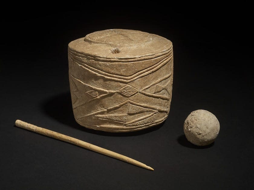 Ancient Burton Agnes chalk drum, a clay ball, and a bone pin