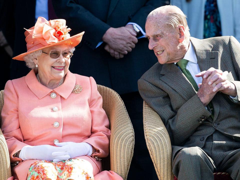 Queen Elizabeth and Prince Philip at the Royal Windsor Cup Final in 2018.